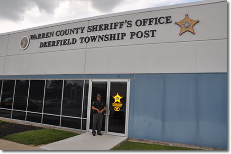 Sheriff Deputy in front of Post